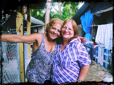 Gloria and Raquel at the shelter, earlier years